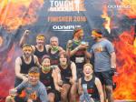 Das Team nach dem Tough Mudder Finish: Sven Goldhorn, Benjamin D&ouml;hrmann, Kevin Kr&uuml;ger, Sabine B&ouml;rner, Jens-Uwe B&ouml;rner, Sylvia K&ouml;hn, Lutz Bittner, Tina B&ouml;rner und Lukasz Jakubczyk (v.l.n.r.) Foto: www.tough.olympus.de 
                                                               Jakubczyk (v.l.n.r.)
